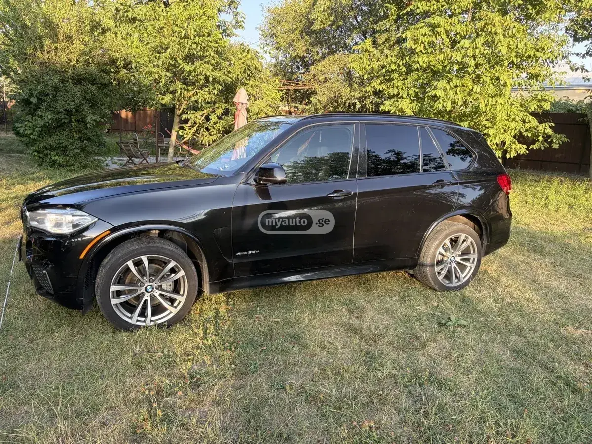 BMW X5 2014 — photo 2