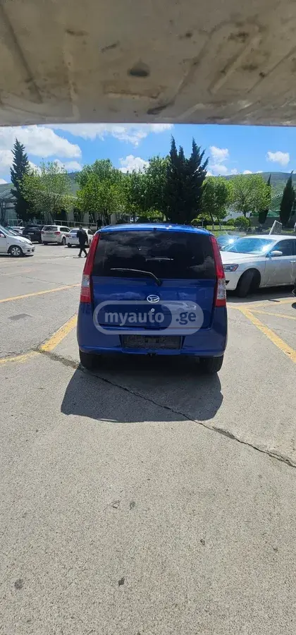 Daihatsu Cuore 2006 — photo 2