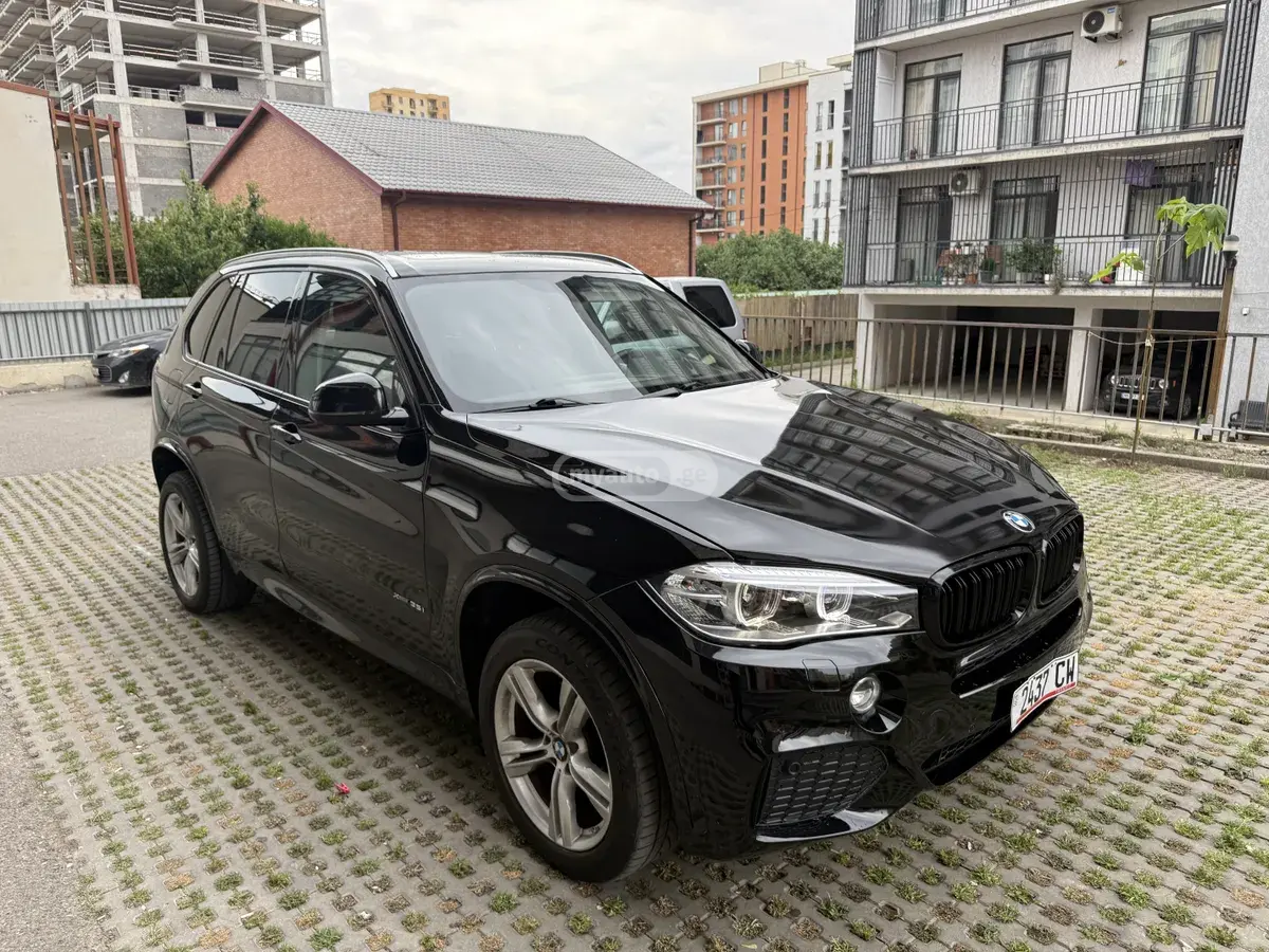 BMW X5 2015 — photo 2