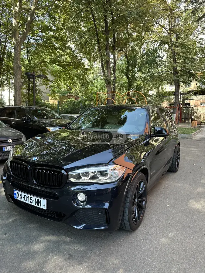 BMW X5 2014 — photo 2
