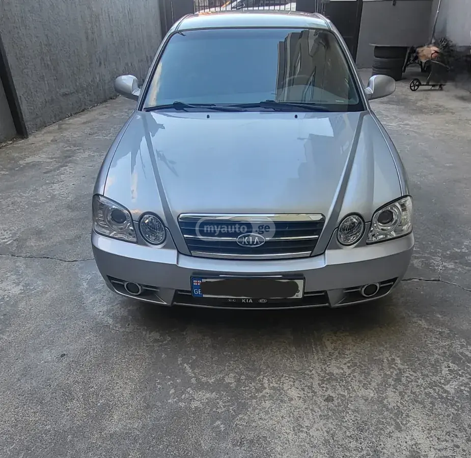 Kia Optima 2004 — photo 2