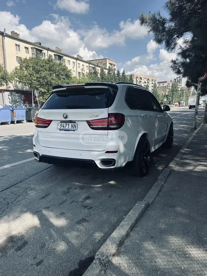 BMW X5 2015 — photo 2