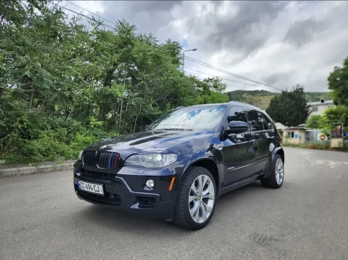BMW X5 2010 — photo 2