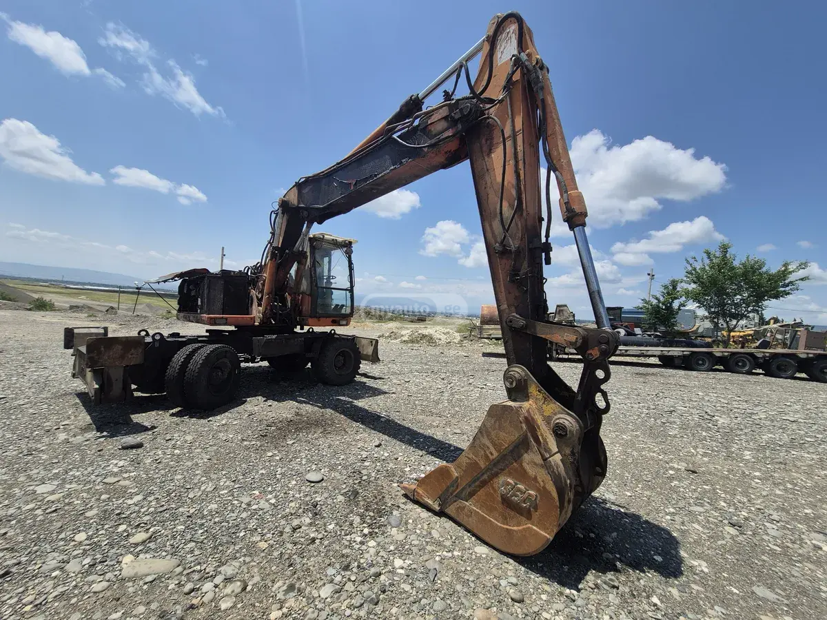 Caterpillar M318 2000 — photo 2