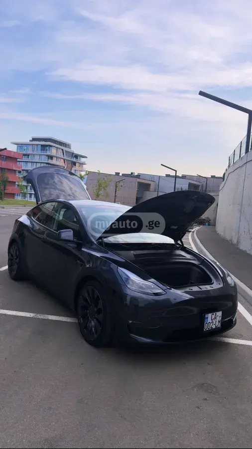 Tesla Model Y 2024 — photo 2