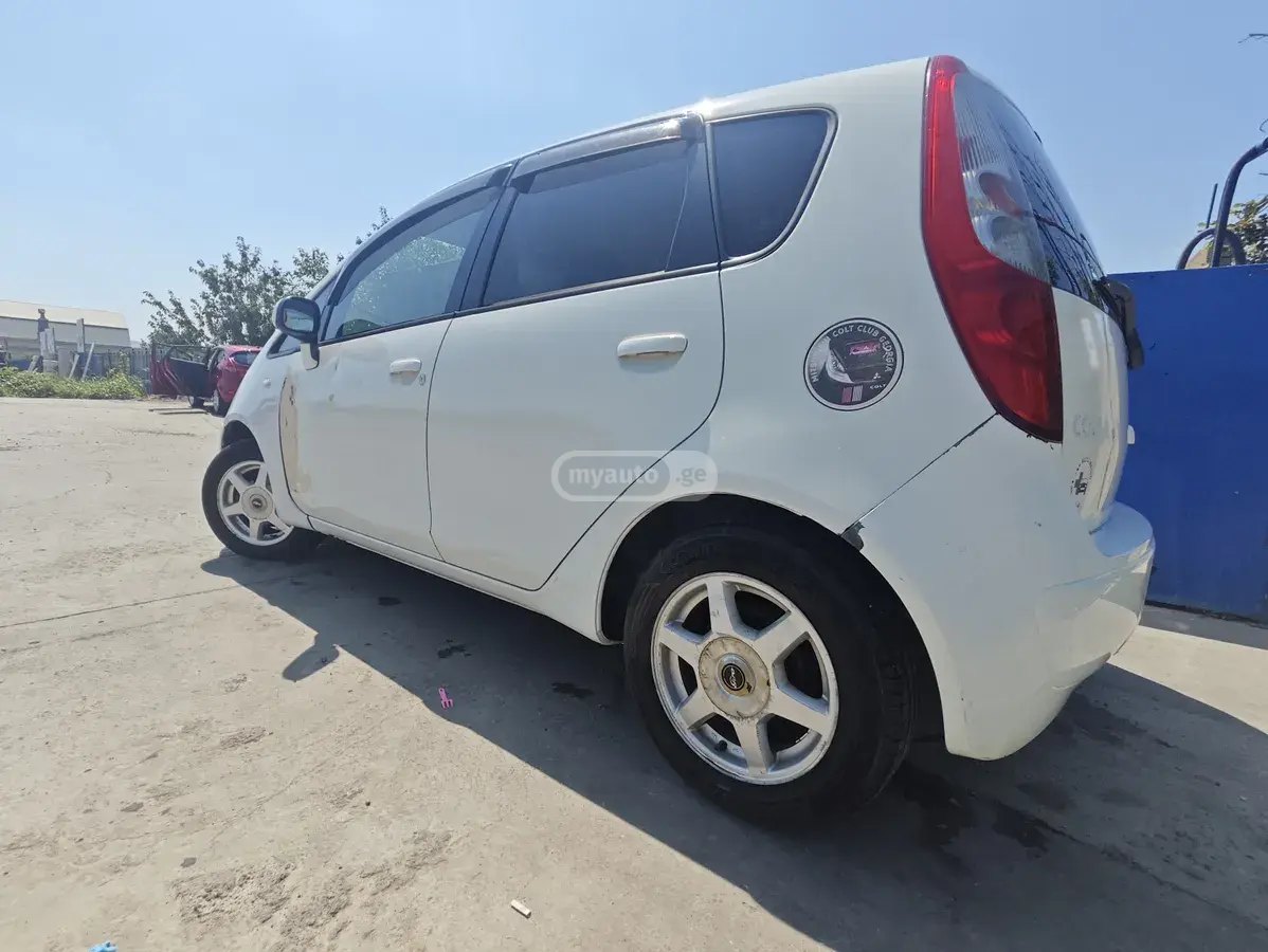 Mitsubishi Colt 2004 — photo 2