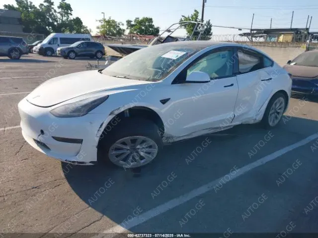 Tesla Model-3-Tesla 2023 — photo 2