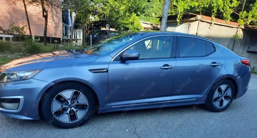 Kia Optima 2011 — photo 2