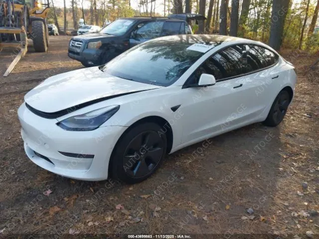 Tesla Model-3-Tesla 2022 — photo 2