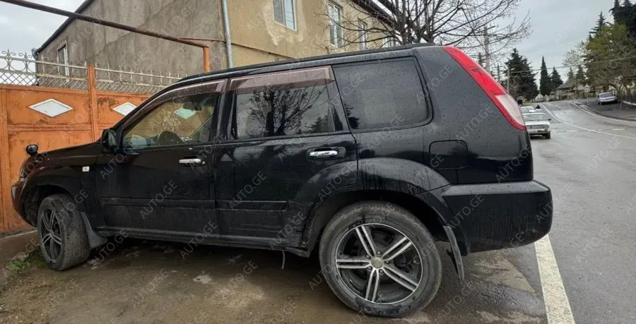 Nissan X-Trail 2004 — photo 2