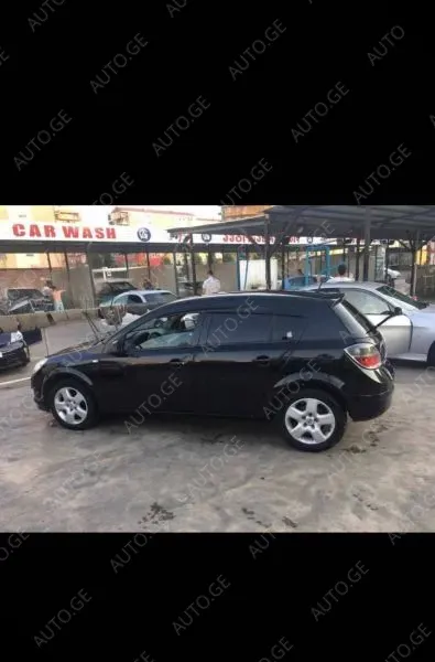 Opel Astra 2009 — photo 2