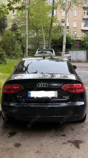 Audi A4 2009 — photo 2