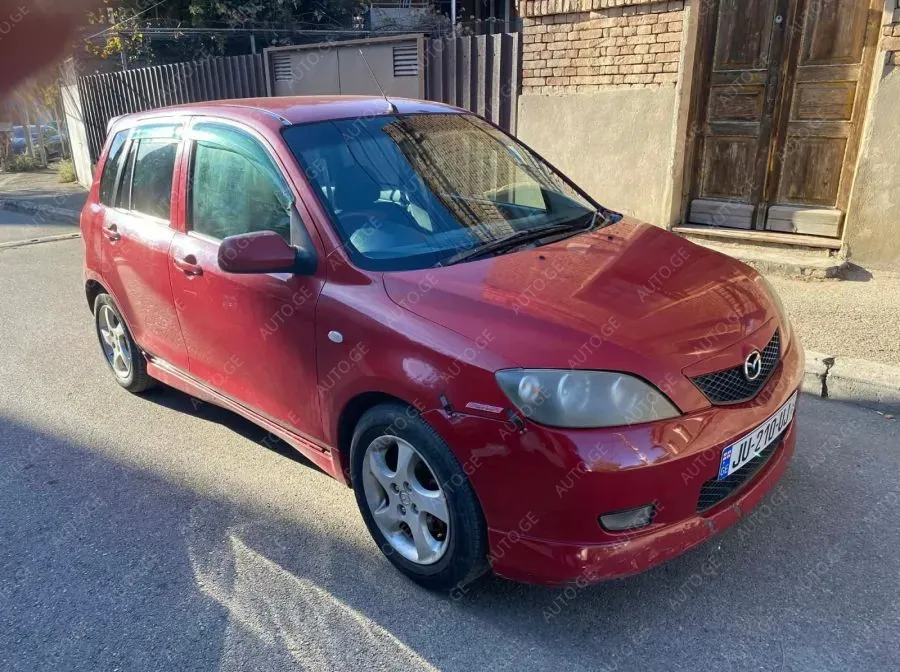 Mazda Demio 2002 — photo 2
