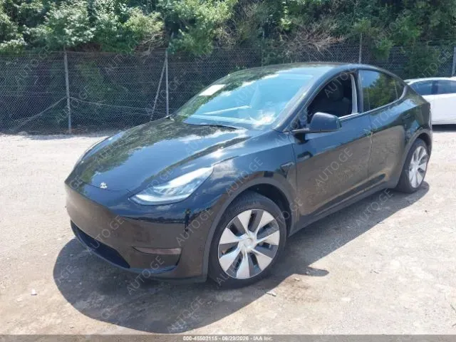 Tesla Model Y 2022 — photo 2