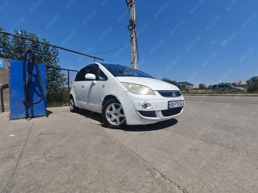 Mitsubishi Colt 2003 — photo 2