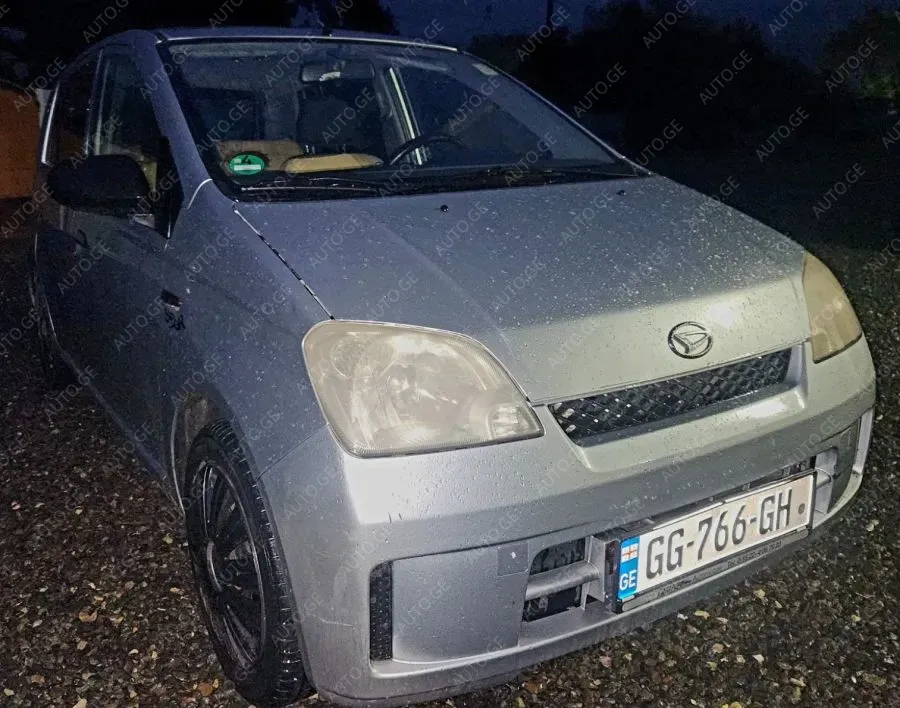 Daihatsu Cuore 2006 — photo 2