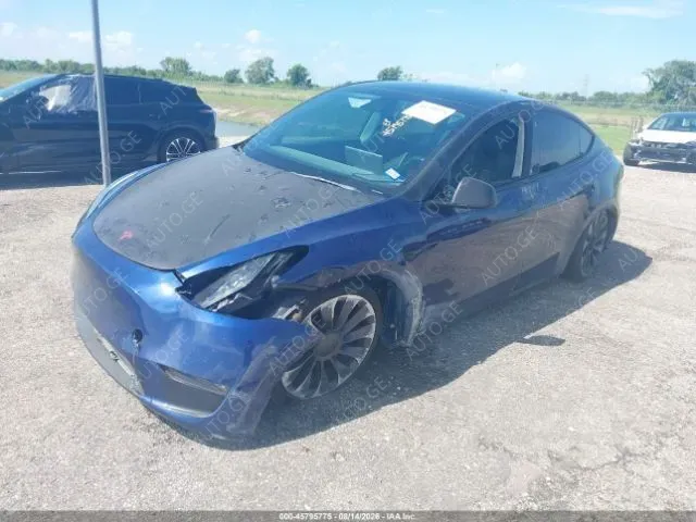 Tesla Model Y 2022 — photo 2
