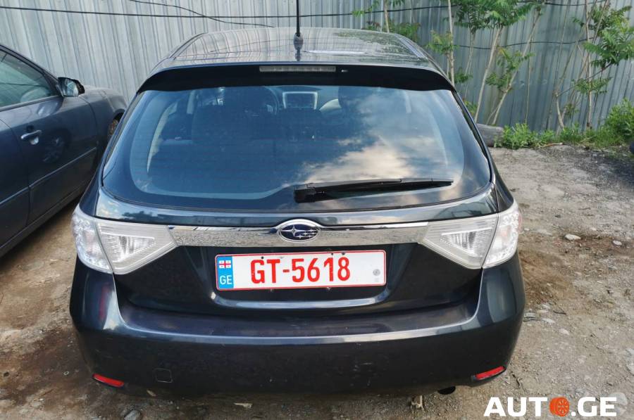 Subaru Impreza 2010 — photo 2