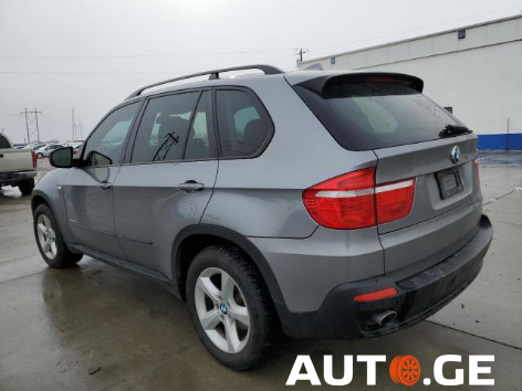 BMW X5 2010 — photo 2