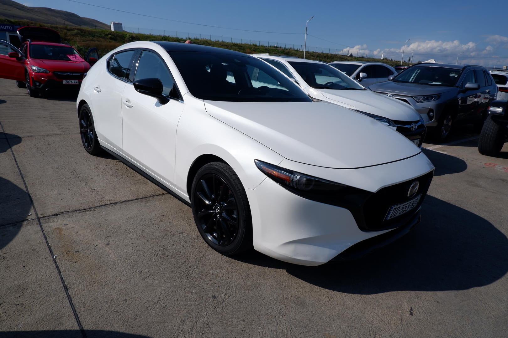 Mazda Mazda3 2021 — photo 2