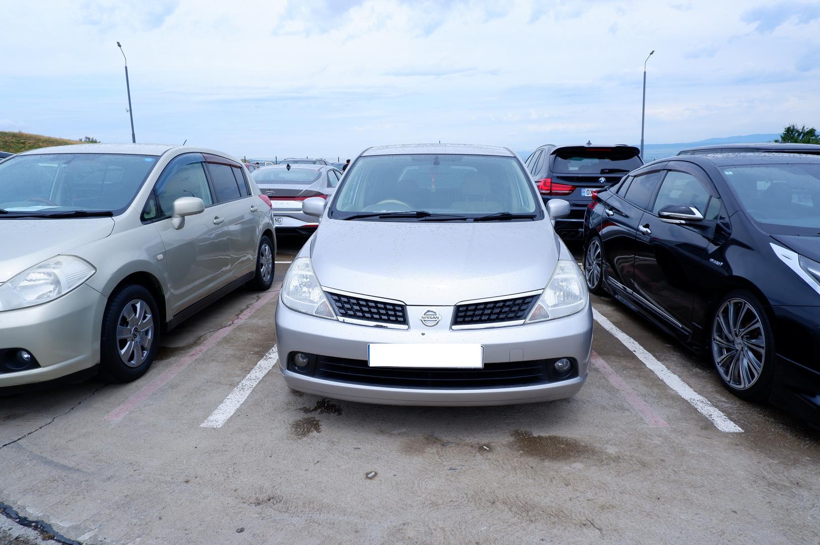 Nissan Tiida 2006 — photo 2