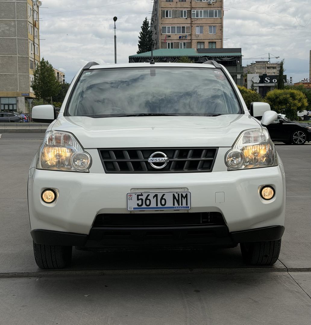 Nissan X-Trail 2010 — photo 2
