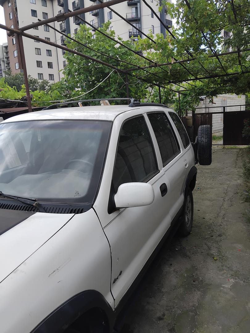 Kia Sportage 2001 — photo 2
