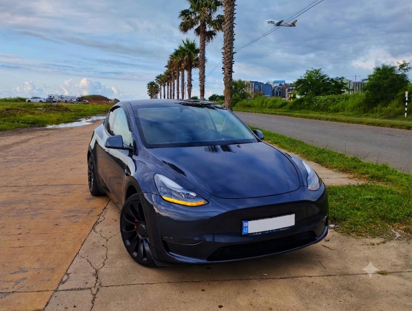 Tesla Model Y 2023 — photo 2
