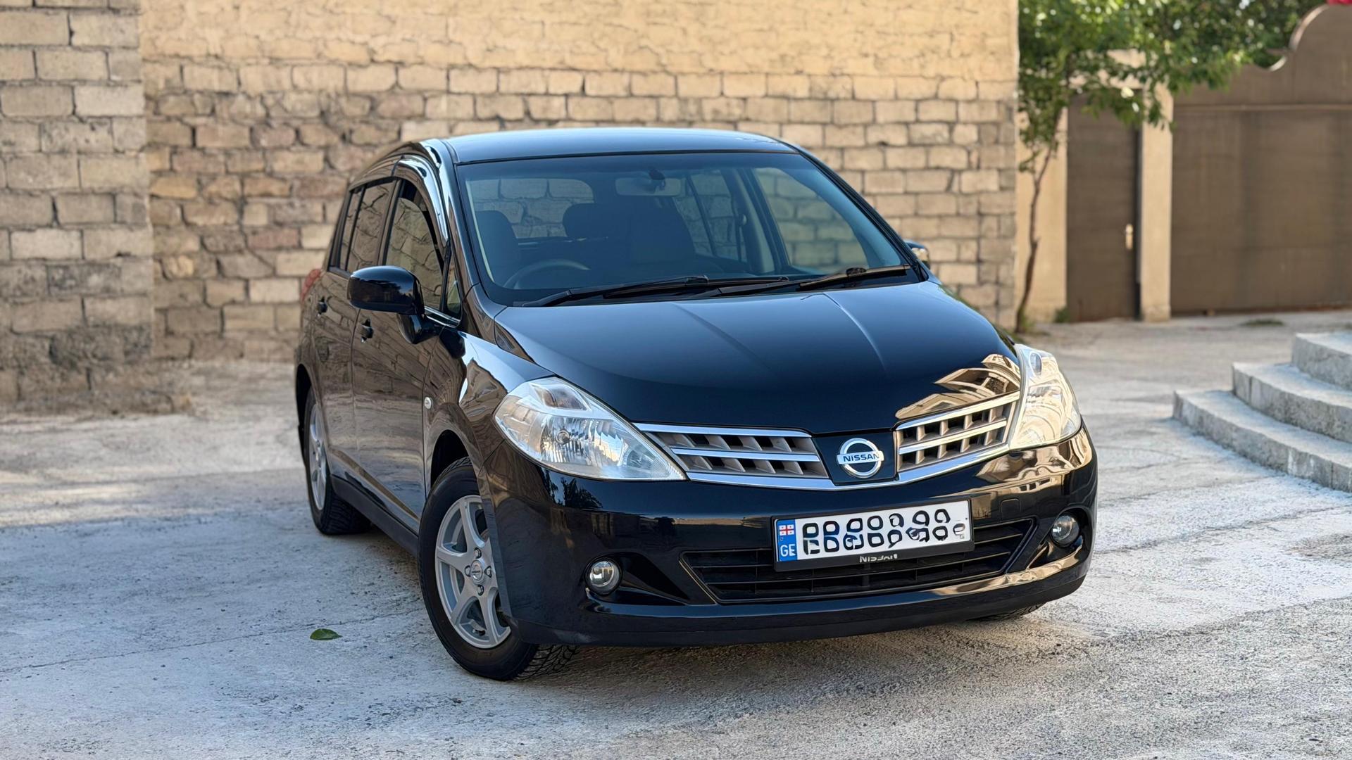 Nissan Tiida 2010 — photo 2