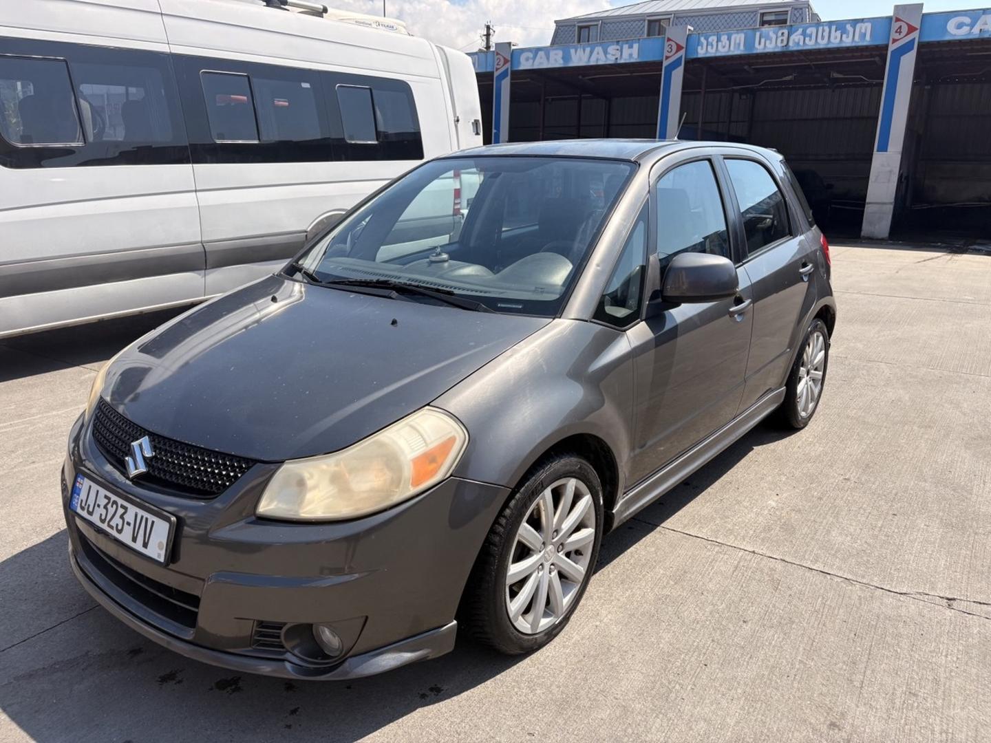 Suzuki SX4 2010 — photo 2