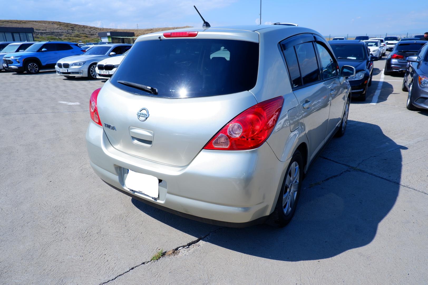 Nissan Tiida 2005 — photo 2